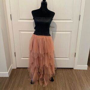 Ruffled skirt looks great with a tube top with blazer over it!